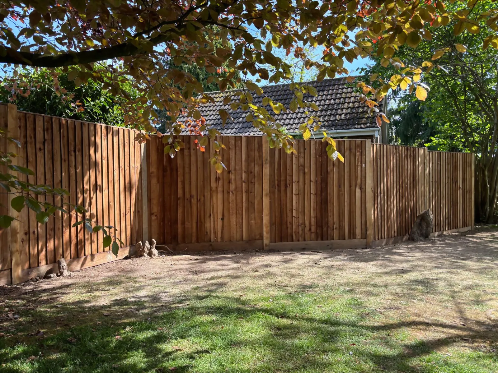 Newly installed closeboard timber fence in a Norwich garden